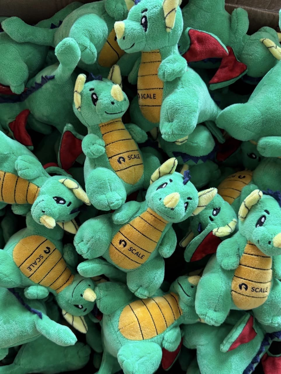 Bulk custom branded plush toys in production at the factory