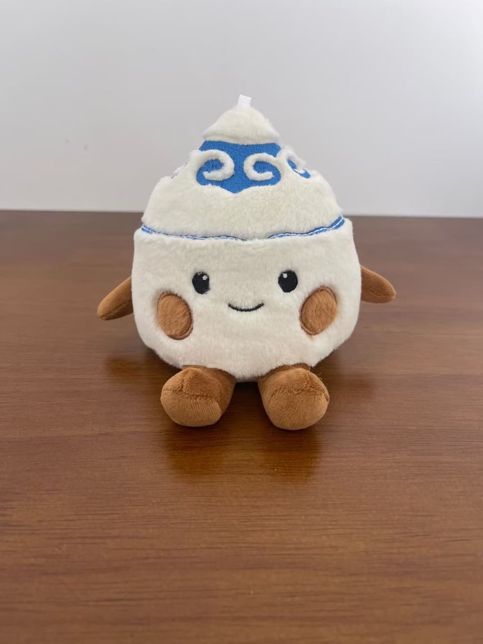 Dumpling character plush toy with a hat