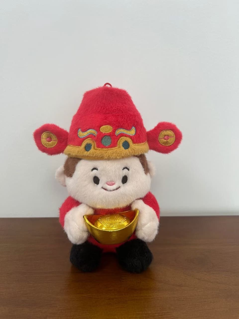 Custom God of Wealth character mascot plush holding a gold ingot