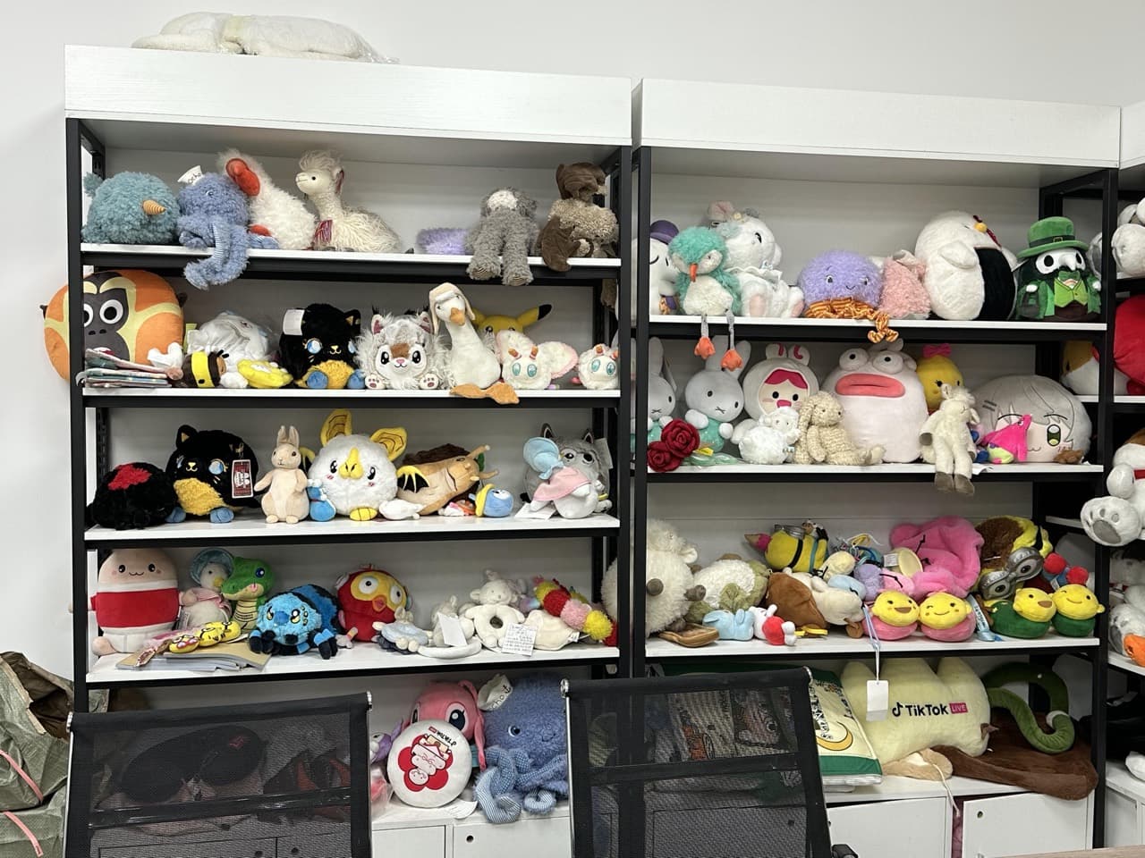 Sample room shelves displaying plush toy prototypes