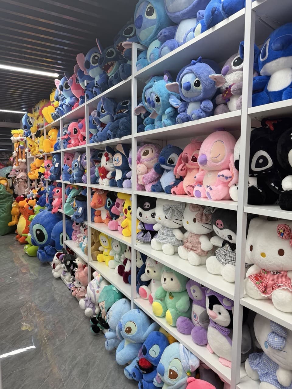 Warehouse shelves filled with stuffed plush toys