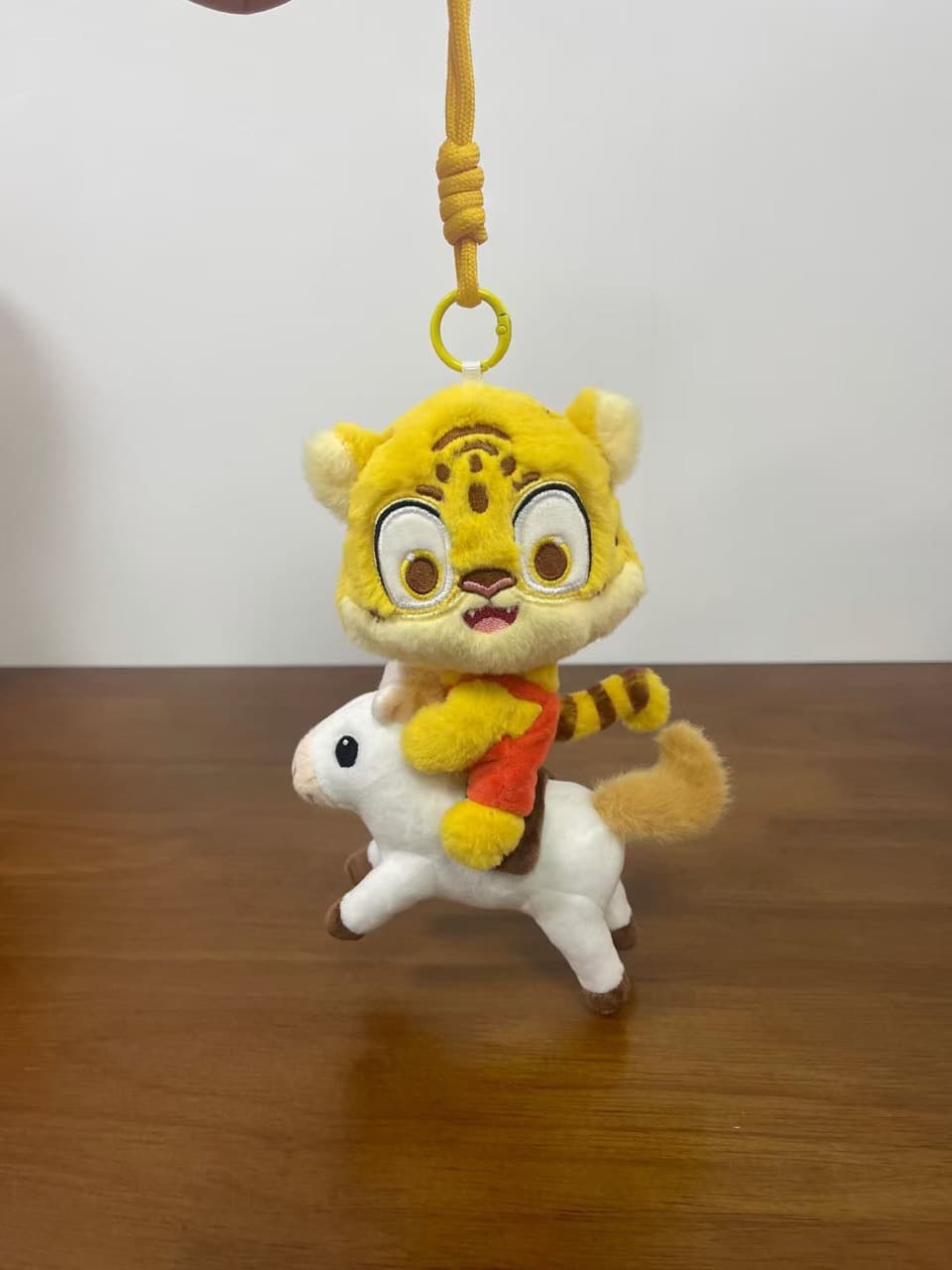Tiger riding goat plush keychain charm